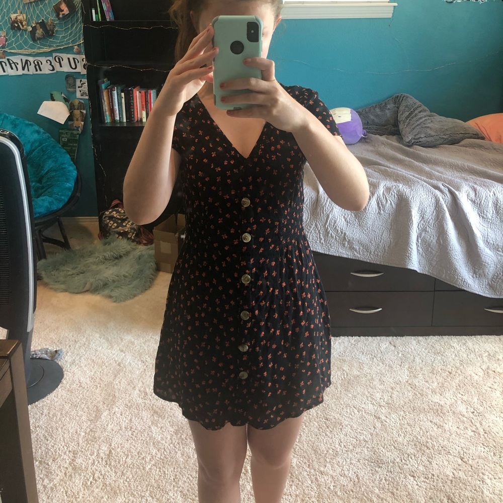 Patrons of Peace Tilly’s floral v-neck dress